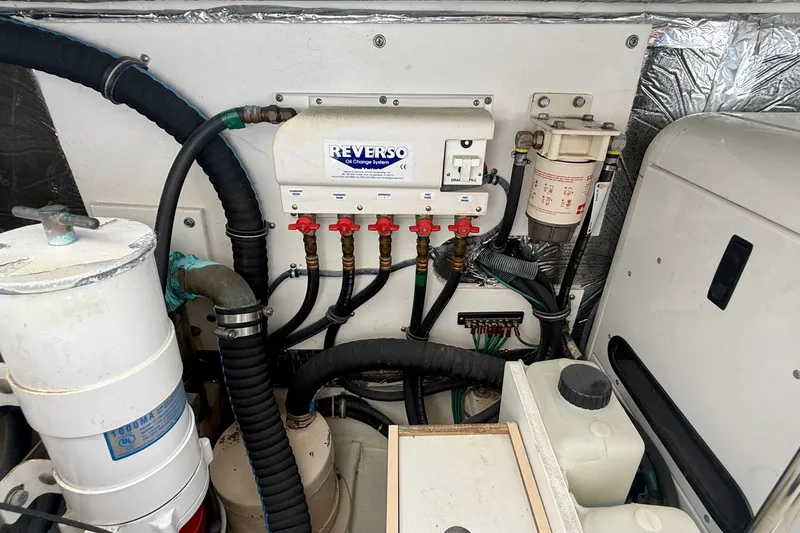 Slide: The Image of Engine compartment of 2006 Tiara Yachts 3600 Sovran with Reverso oil change system. - 69
