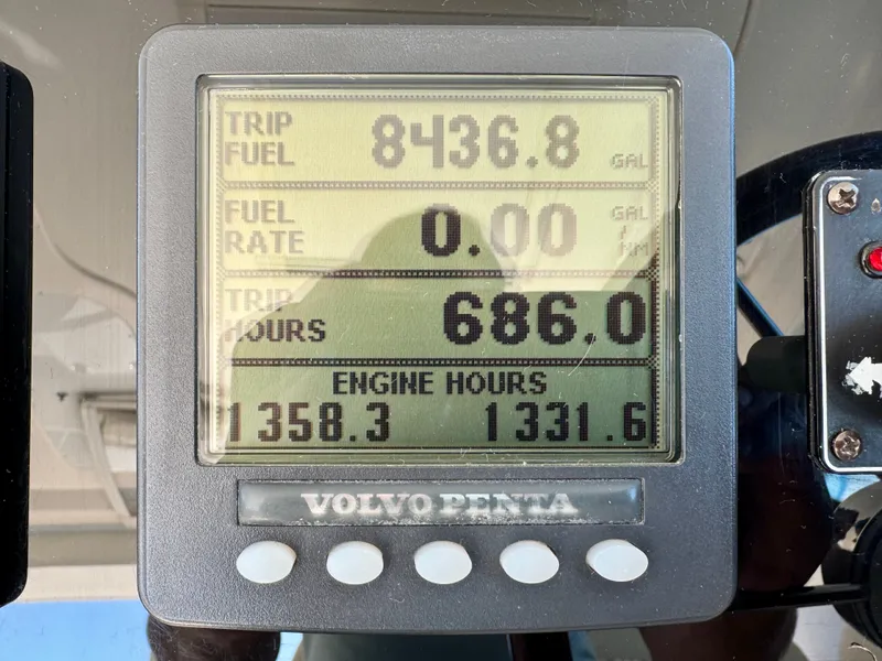 Slide: The Image of Volvo Penta monitor displays 8436.8 gallons fuel used and 1358.3 engine hours. - 33