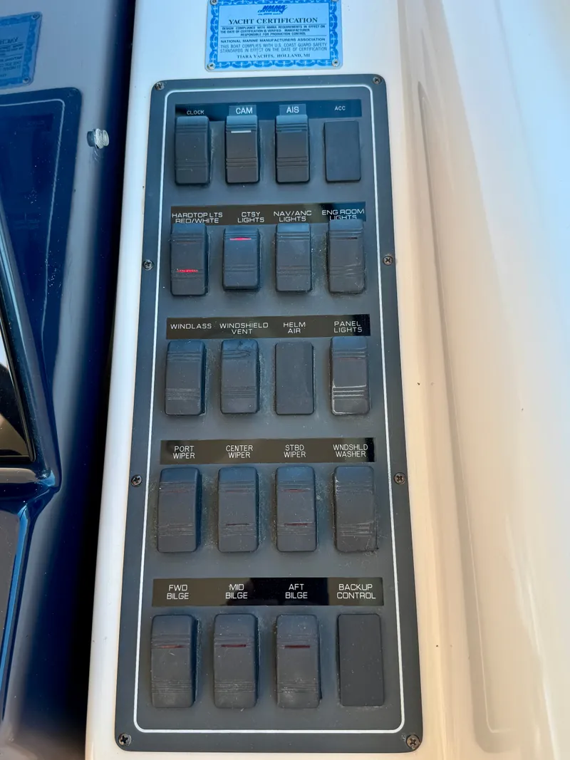 Slide: The Image of Control panel with various switches for boat operations and functions. - 32