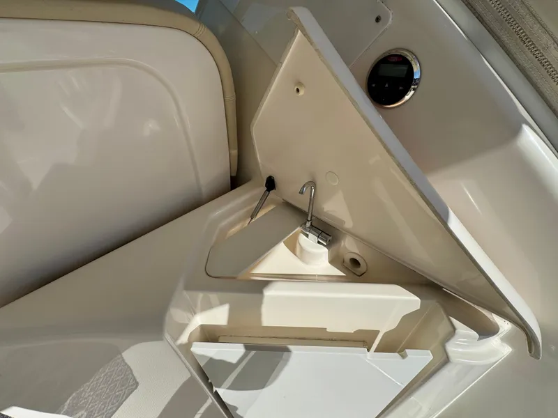 Slide: The Image of An open storage compartment on a 2006 Tiara Yachts 4300 Sovran. - 24
