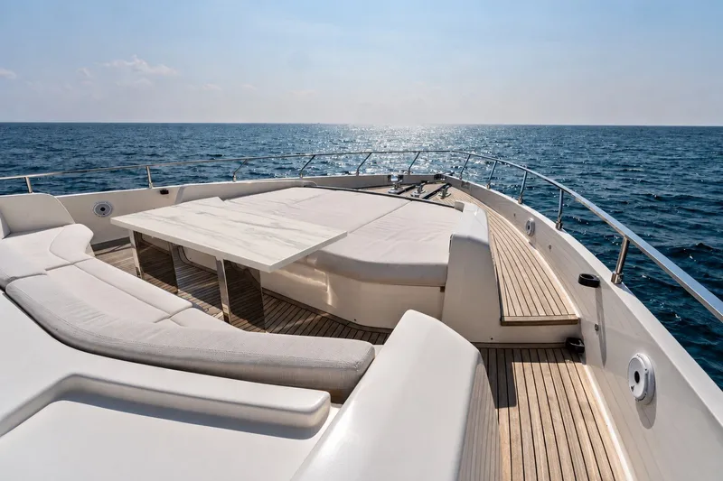 Slide: The Image of Luxurious 2022 Ferretti 850 yacht deck with elegant seating and ocean view. - 77