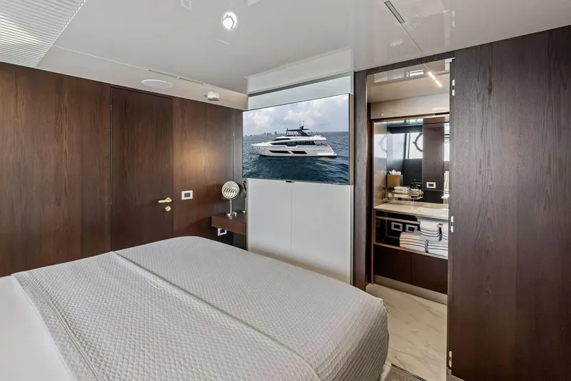 Slide: The Image of Luxurious interior of 2022 Ferretti 850 yacht, featuring elegant bedroom and modern bathroom. - 48