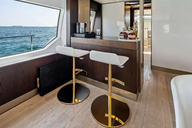 Slide: The Image of Luxurious interior of 2022 Ferretti 850 yacht with elegant bar and ocean view. - 34