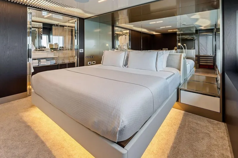 Slide: The Image of Luxurious bedroom interior on 2022 Ferretti 850 yacht, featuring modern design and ambient lighting. - 44