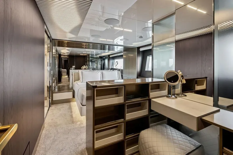 Slide: The Image of Luxurious interior of 2022 Ferretti 850 yacht featuring elegant bedroom and vanity area. - 42