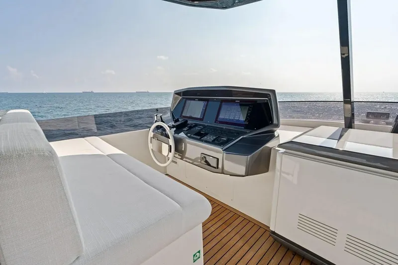 Slide: The Image of Luxurious helm of 2022 Ferretti 850 yacht with ocean view and modern controls. - 14