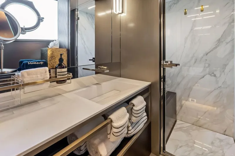 Slide: The Image of Luxurious bathroom in 2022 Ferretti 850 yacht with marble shower and modern vanity. - 54