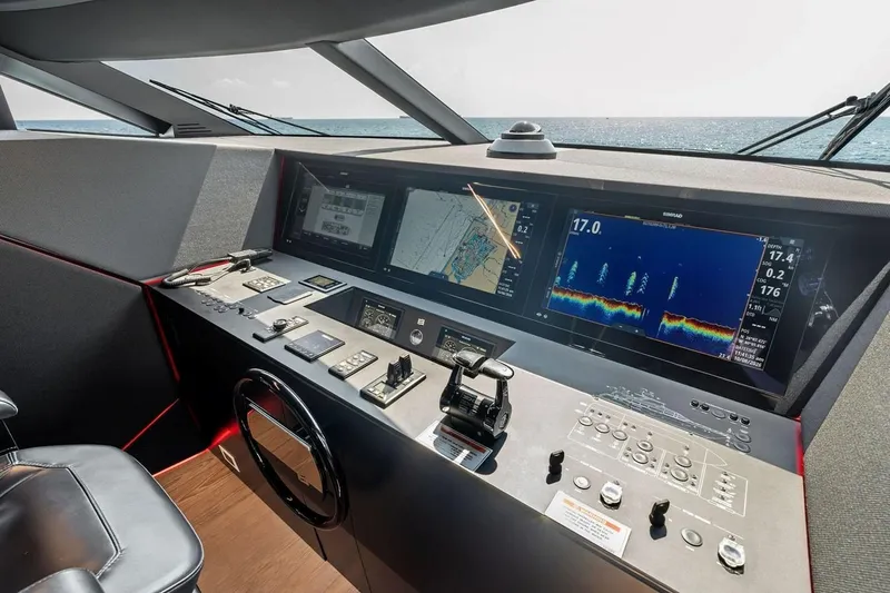 Slide: The Image of Cockpit of 2022 Ferretti 850 yacht with advanced navigation and control systems. - 39