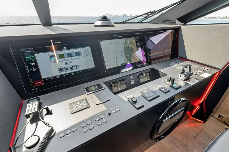 Slide: The Image of Modern helm station of 2022 Ferretti 850 yacht with advanced navigation displays. - 38