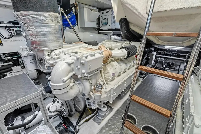 Slide: The Image of Engine room of a 2022 Ferretti 850 yacht, showcasing advanced machinery and equipment. - 65