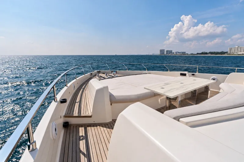 Slide: The Image of Luxurious 2022 Ferretti 850 yacht deck with ocean view and elegant seating area. - 72