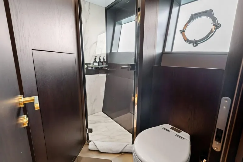 Slide: The Image of Luxurious bathroom on 2022 Ferretti 850 yacht with modern fixtures and elegant design. - 58