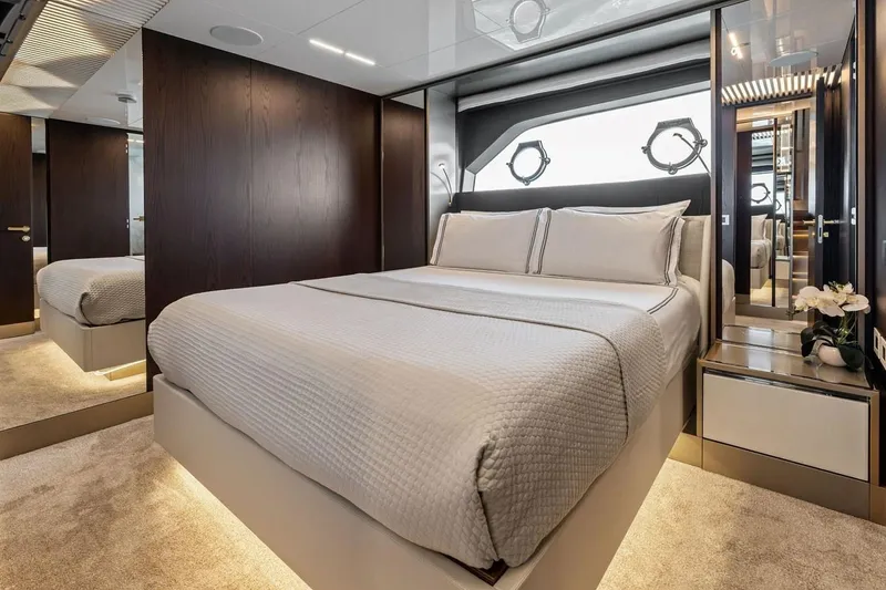 Slide: The Image of Luxurious bedroom interior on 2022 Ferretti 850 yacht, featuring elegant design and modern amenities. - 52