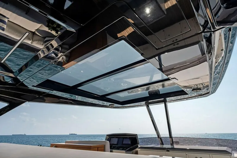 Slide: The Image of Luxurious 2022 Ferretti 850 yacht with sleek design and ocean view. - 13