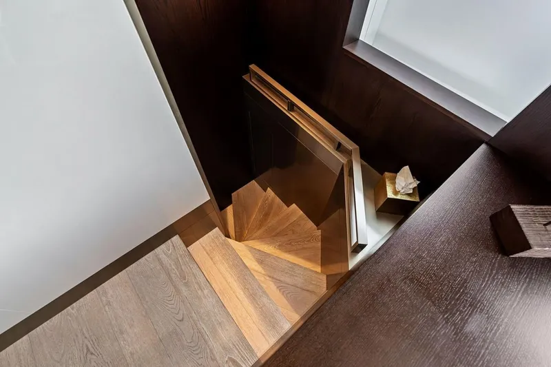 Slide: The Image of Elegant wooden staircase on 2022 Ferretti 850 yacht, featuring modern design and sleek finishes. - 41