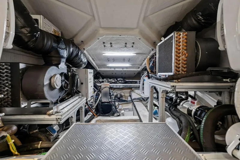 Slide: The Image of Engine room of a 2022 Ferretti 850 yacht, showcasing advanced mechanical systems. - 67