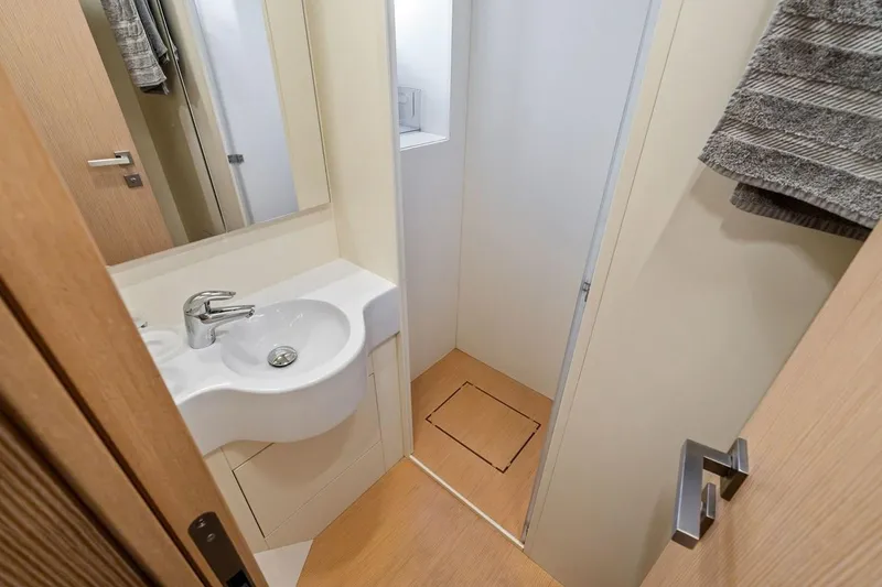 Slide: The Image of Modern bathroom interior on 2022 Ferretti 850 yacht, featuring sleek sink and minimalist design. - 62