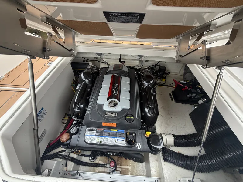 Slide: The Image of The engine compartment of a 2025 Chaparral 267 SSX with a 350 HP engine. - 22