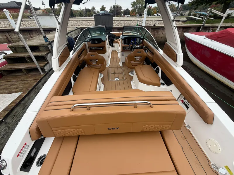 Slide: The Image of Chaparral 267 SSX 2025: Luxurious interior with tan upholstery and modern cockpit. - 17