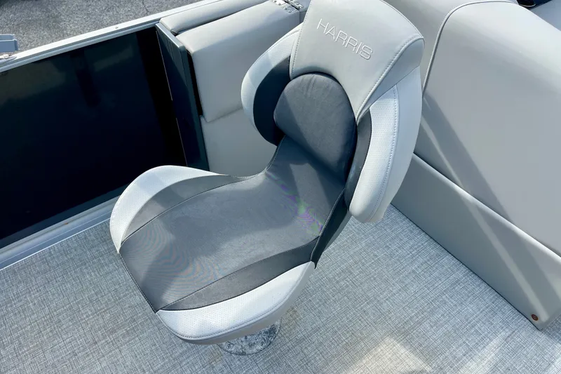 Slide: The Image of 2024 Harris Cruiser 230 boat seat with sleek, modern design and comfortable upholstery. - 10