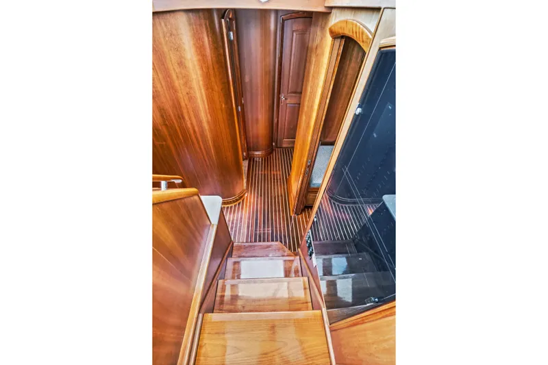 Slide: The Image of Interior view of 2007 Hinckley Talaria 55 yacht with elegant wooden finishes. - 37
