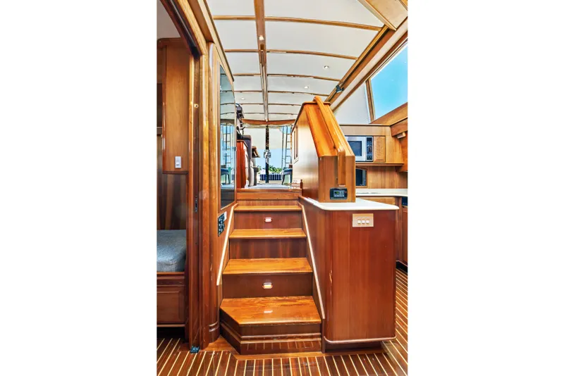 Slide: The Image of Interior of 2007 Hinckley Talaria 55 yacht with elegant wooden stairs and cabinetry. - 23