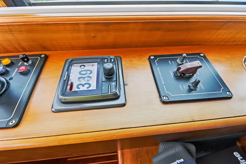 Slide: The Image of Control panel of 2007 Hinckley Talaria 55 yacht with navigation instruments. - 27