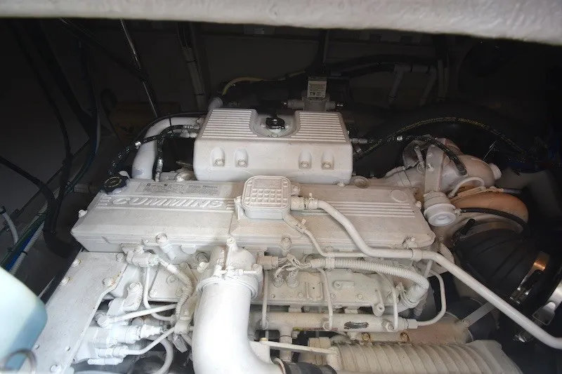 Slide: The Image of Engine compartment of a 2015 Sea Ray 510 Fly yacht featuring a Cummins engine. - 33
