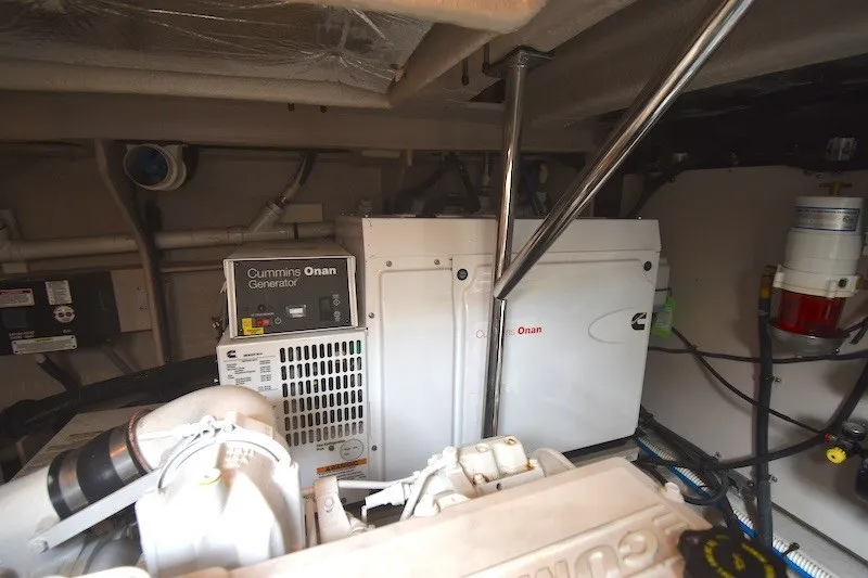 Slide: The Image of Engine room of 2015 Sea Ray 510 Fly with Cummins Onan generator. - 38