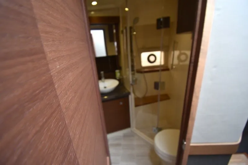 Slide: The Image of Luxurious bathroom interior of 2015 Sea Ray 510 Fly yacht with modern fixtures. - 18