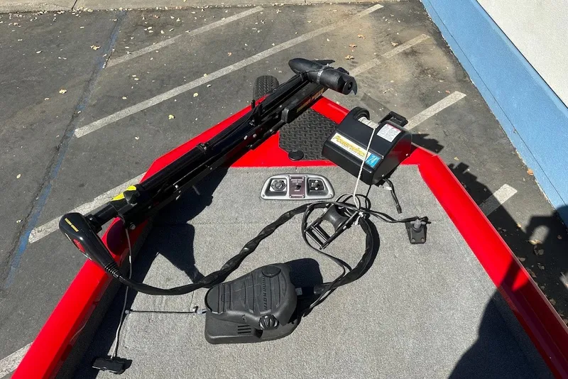 Slide: The Image of 2012 Tracker Pro Team 175 TXW boat deck with trolling motor and foot pedal. - 18