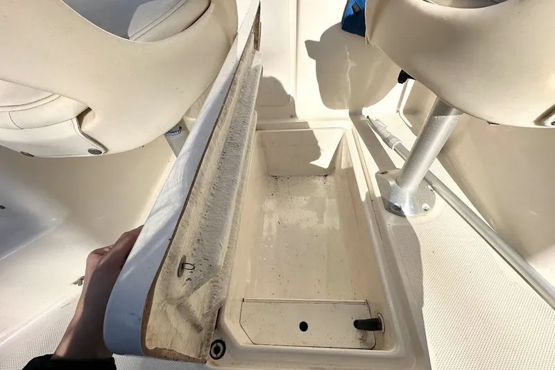 Slide: The Image of 2005 Trophy 1802 Walkaround boat interior storage compartment with open hatch. - 29