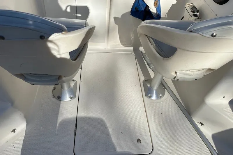 Slide: The Image of Interior of a 2005 Trophy 1802 Walkaround boat showing two swivel seats. - 28