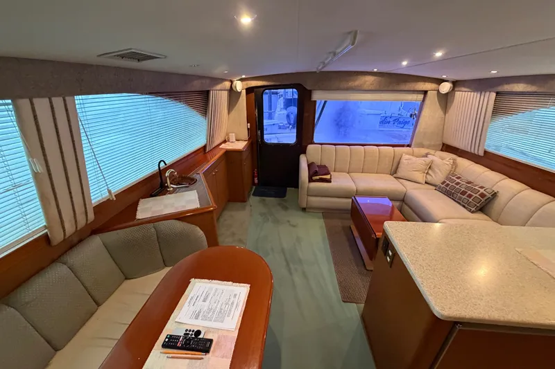 Slide: The Image of Luxurious interior of a 2001 Ocean Yachts 48 Super Sport with plush seating and elegant decor. - 31