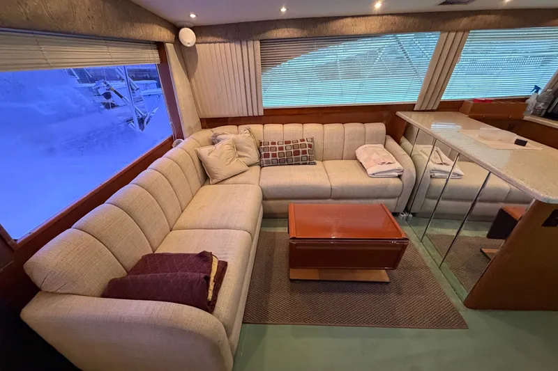 Slide: The Image of Luxurious interior of 2001 Ocean Yachts 48 Super Sport with plush seating and elegant decor. - 29