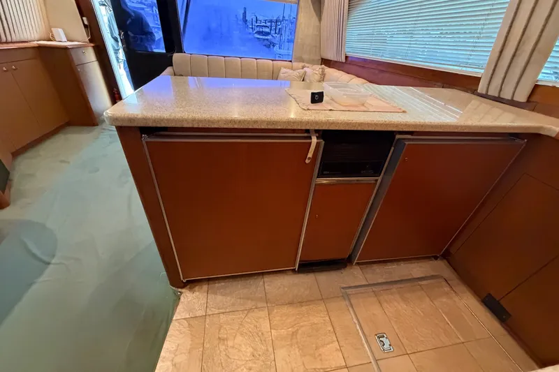 Slide: The Image of Interior of 2001 Ocean Yachts 48 Super Sport with kitchen counter and cabinets. - 39
