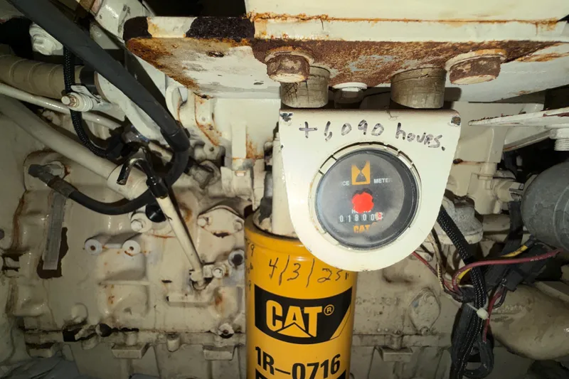 Slide: The Image of Engine compartment of 2001 Ocean Yachts 48 Super Sport with CAT hour meter. - 61