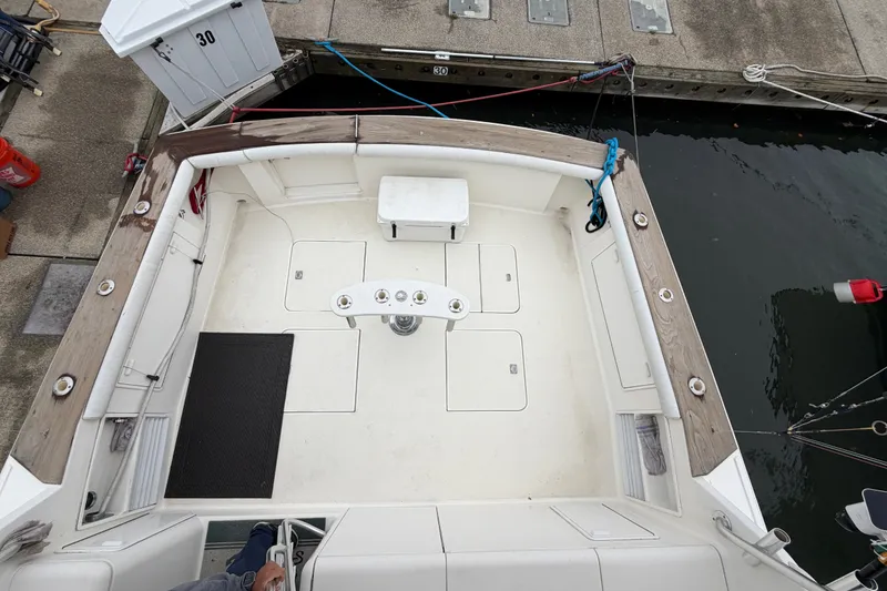 Slide: The Image of 2001 Ocean Yachts 48 Super Sport boat deck, docked at marina. - 19
