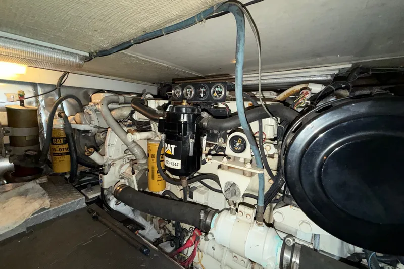 Slide: The Image of Engine room of a 2001 Ocean Yachts 48 Super Sport, featuring CAT machinery. - 60