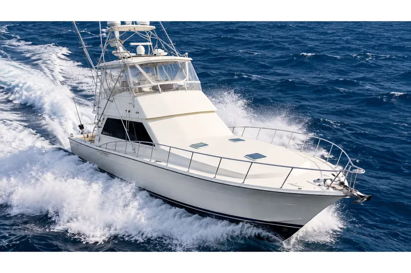 The Image of 1989 Viking 45 Convertible yacht cruising on open ocean waters. - 0