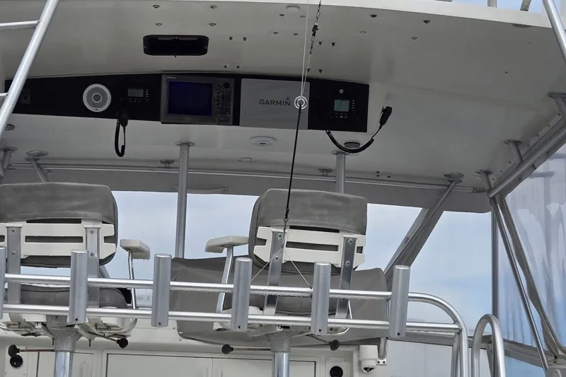 Slide: The Image of Interior view of 1989 Viking 45 Convertible boat cockpit with navigation equipment. - 12