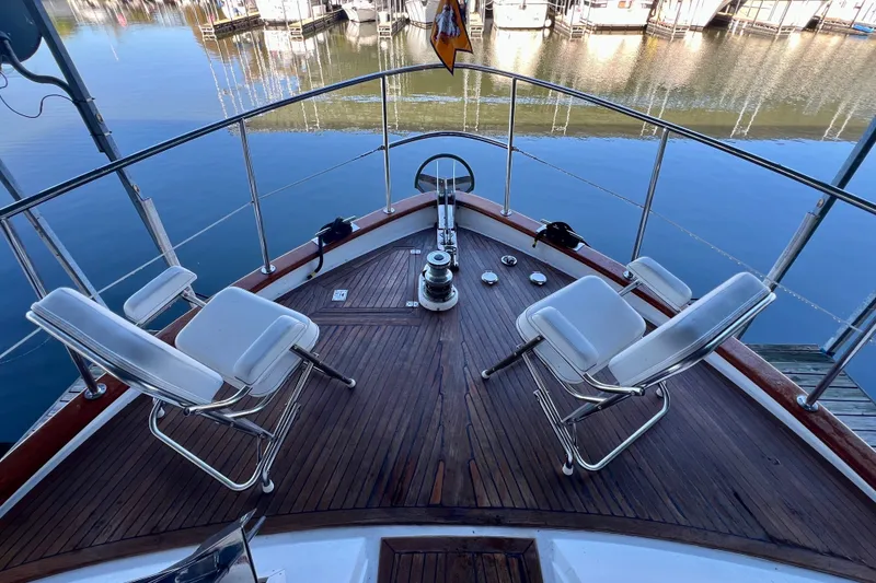Slide: The Image of Deck view of 2000 Ocean Alexander 430 Classicco yacht with chairs and railing. - 41