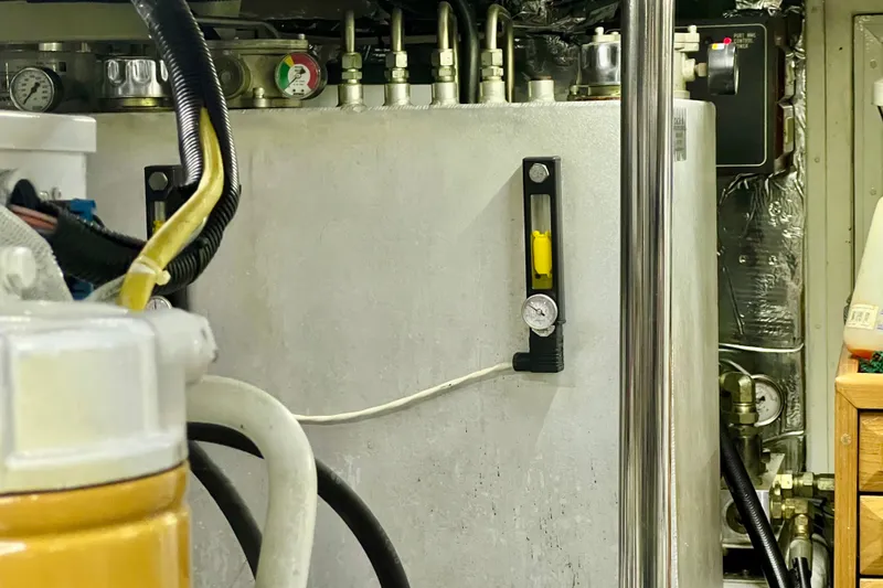 Slide: The Image of Engine room of 2000 Ocean Alexander 430 Classicco yacht with gauges and wiring. - 60