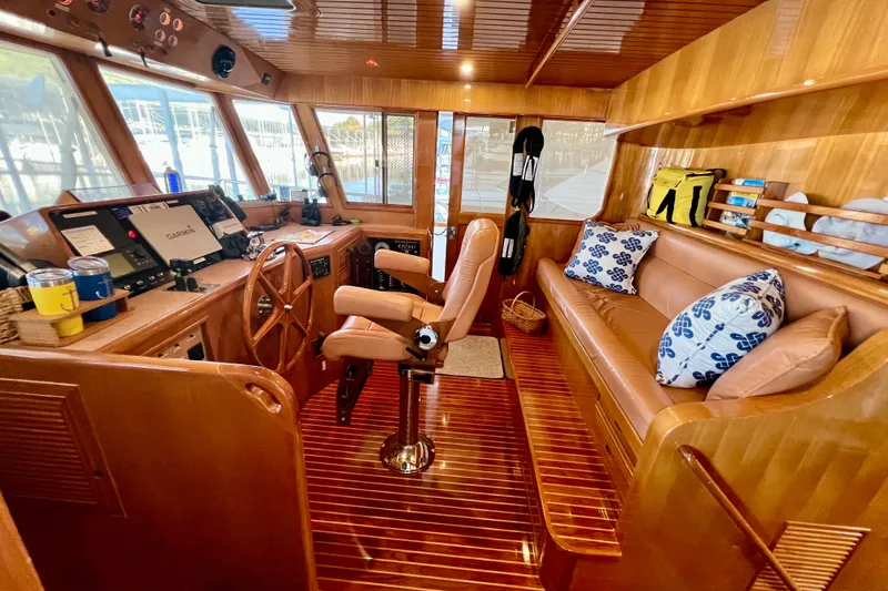 Slide: The Image of Luxurious interior of 2000 Ocean Alexander 430 Classicco yacht with wooden finishes and plush seating. - 19