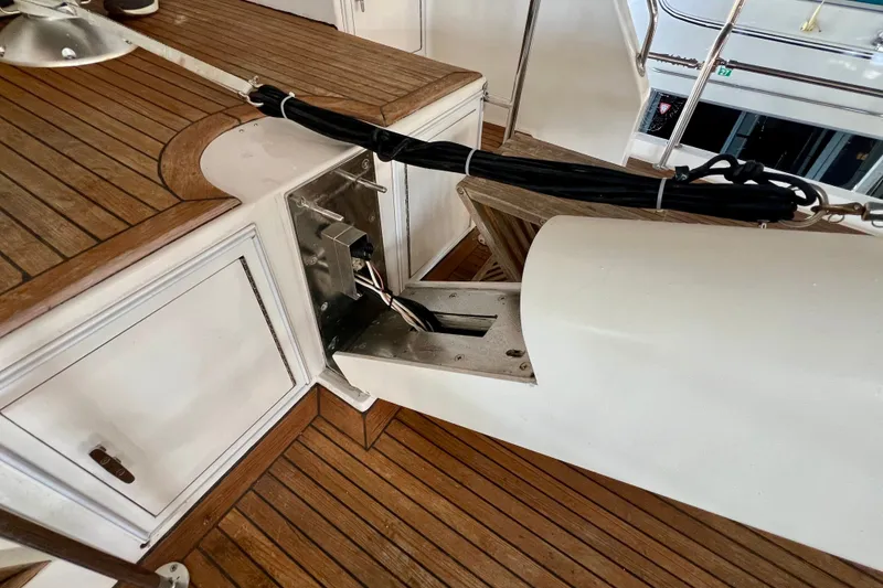Slide: The Image of Teak deck and storage compartment on 2000 Ocean Alexander 430 Classicco yacht. - 48