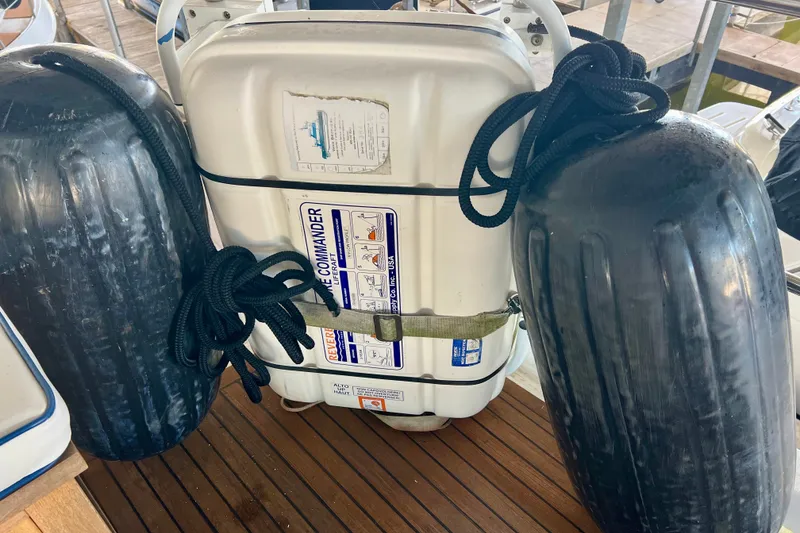 Slide: The Image of Life raft and fenders on 2000 Ocean Alexander 430 Classicco yacht deck. - 51