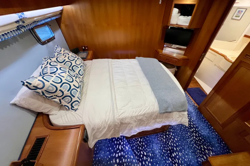 Slide: The Image of Cozy bedroom in 2000 Ocean Alexander 430 Classicco yacht with nautical decor. - 35