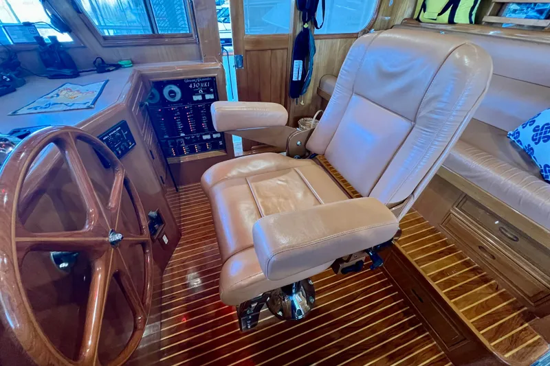 Slide: The Image of Captain's chair and helm of 2000 Ocean Alexander 430 Classicco yacht interior. - 20