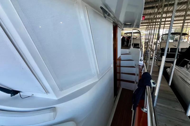 Slide: The Image of Side view of 2000 Ocean Alexander 430 Classicco yacht in a marina. - 46