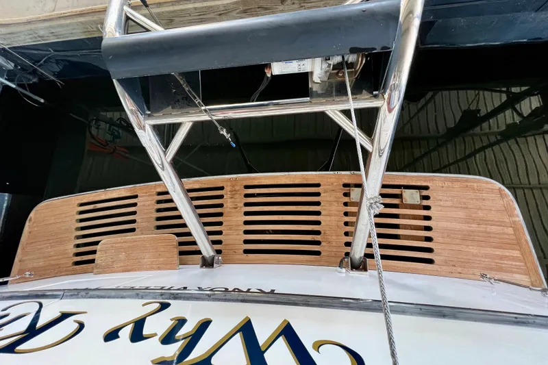 Slide: The Image of Stern view of 2000 Ocean Alexander 430 Classicco yacht with wooden deck and metal railing. - 66